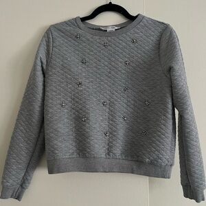 Switshot, cardigan. Sweater.